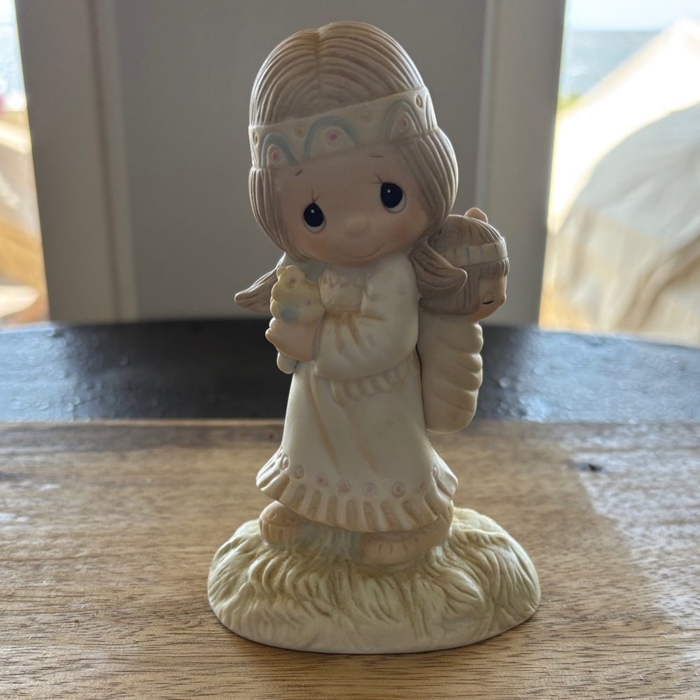 Precious Moments “His Burden Is Light” porcelain figurine